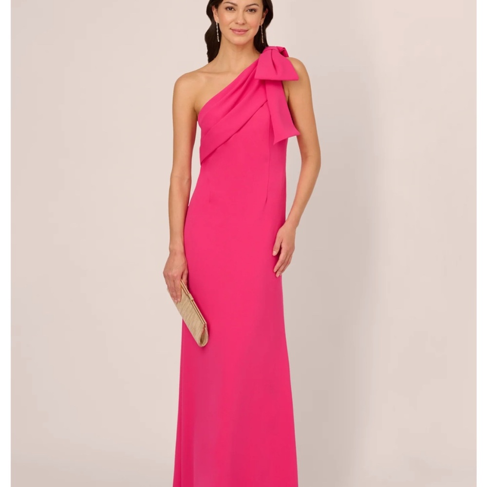 STRETCH CREPE ONE SHOULDER MERMAID GOWN WITH BOW ACCENT IN HOT PINK